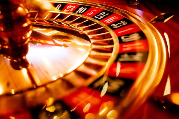 Fa Cai Shen Deluxe slot game interface on mobile showing five reels, bet controls, and spin button