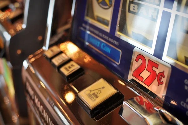 Mobile phone screen showing Ganesha Gold game with optimized touch controls and account balance display